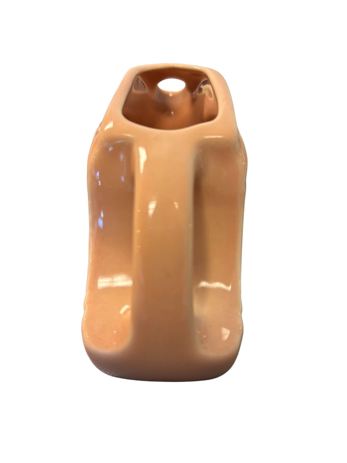 This is a Fiesta Fiestaware Mini Disc Pitcher Creamer in Apricot. lead-free, Post 1986, Retired Color 5 ounce