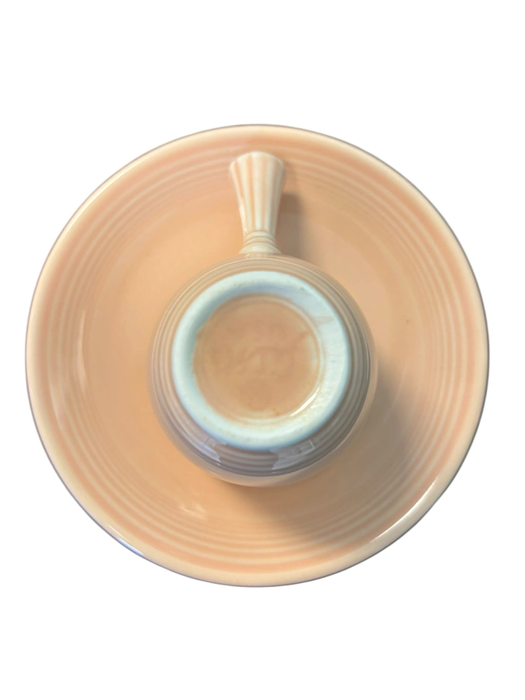This is a Fiesta Fiestaware After Dinner AD Stick Handled Demitasse Demi Cup and Saucer Set in Apricot. lead-free, Post 1986, Retired Color Retired Shape Perfect for Espresso