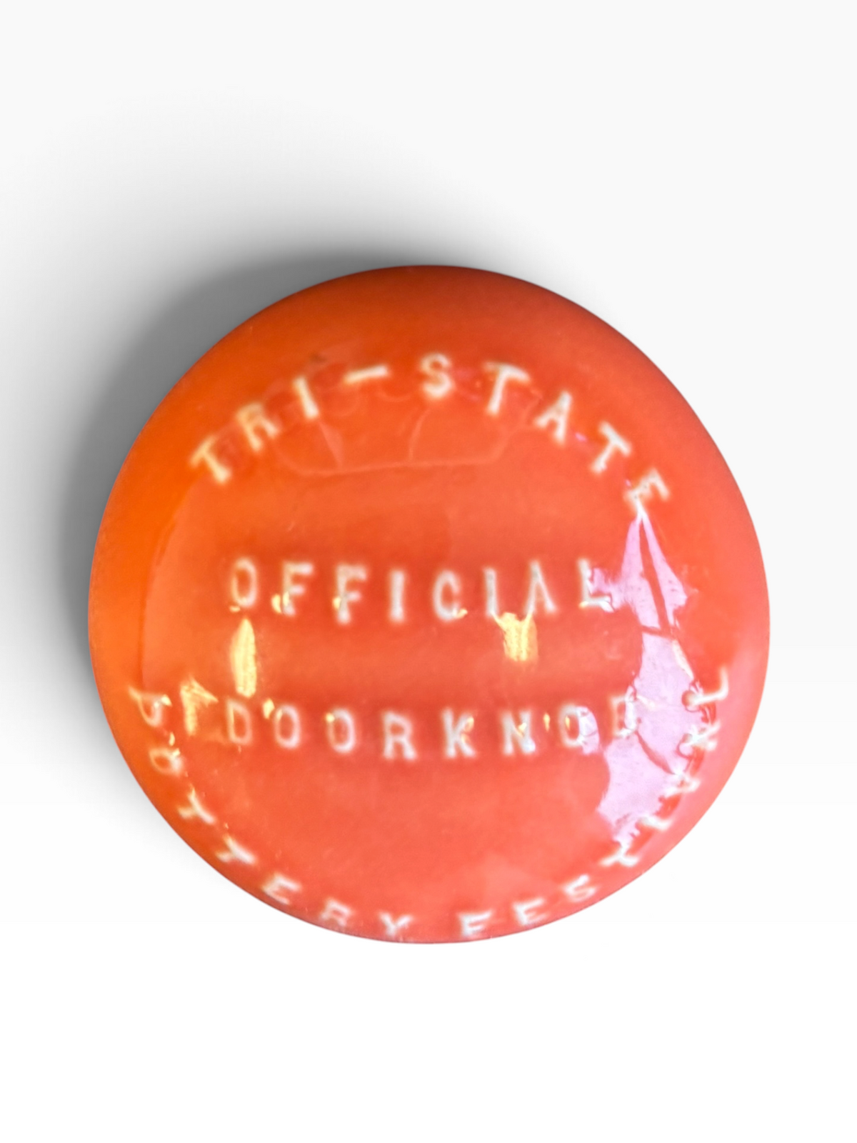 Tri-State Pottery Festival Official Doorknob in Fiesta Persimmon | HLC Toss Game