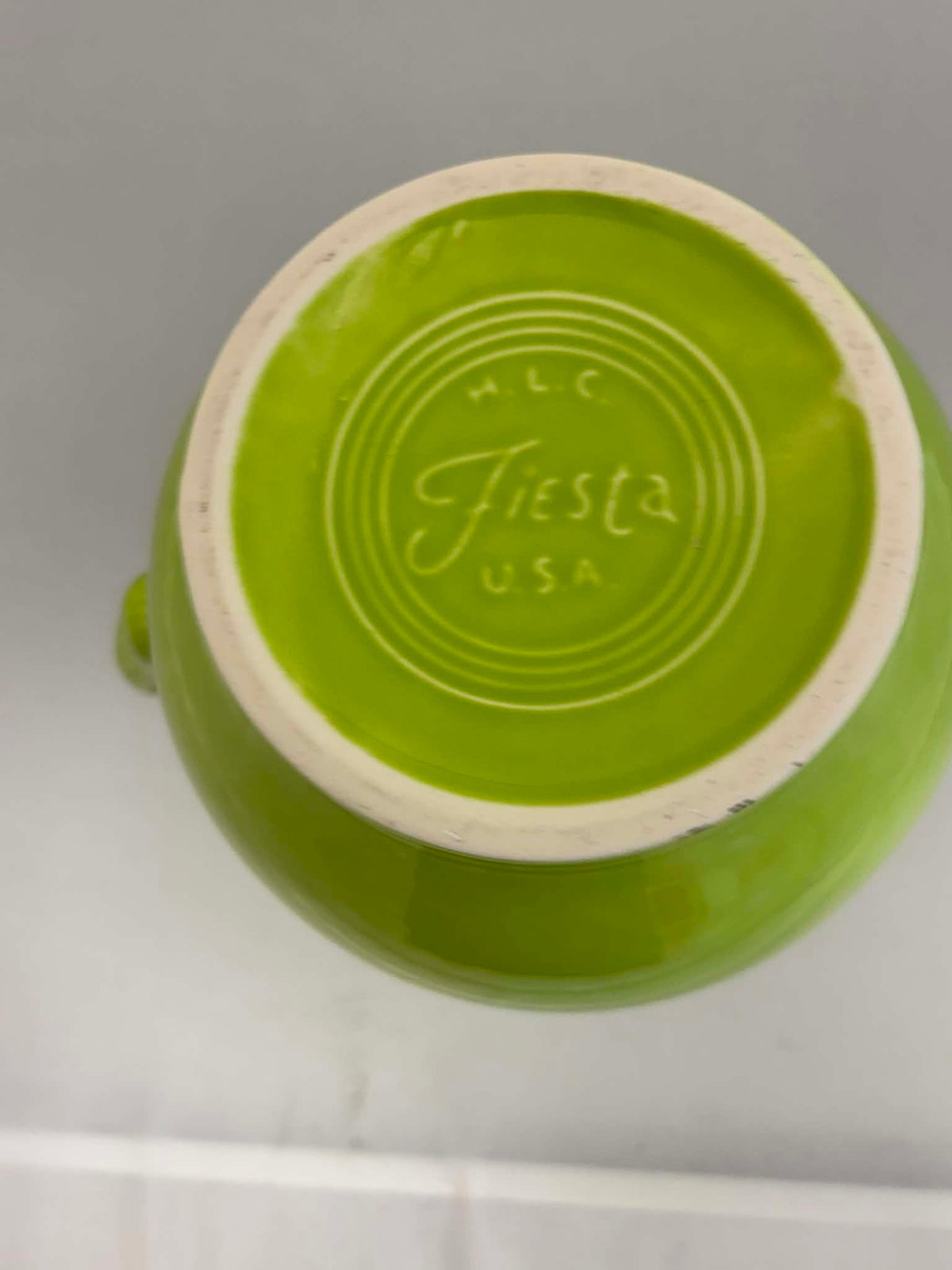 This is a Fiesta Fiestware small 60 Ounce Carafe in chartreuse. Lead-free Post 1986 Retired color retired shape
