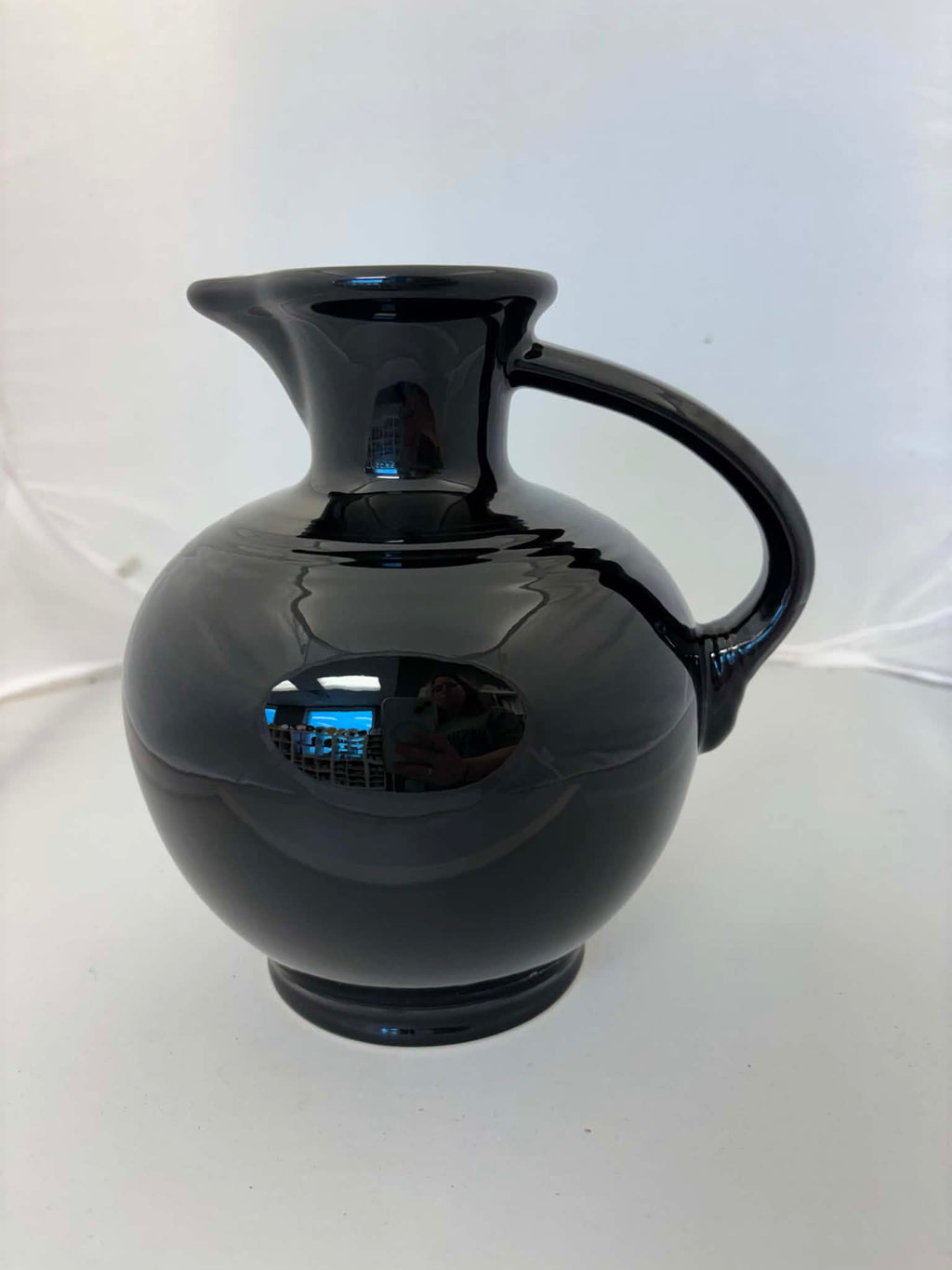 This is a Fiesta Fiestware small 60 Ounce Carafe in black. Lead-free Post 1986 Retired color retired shape
