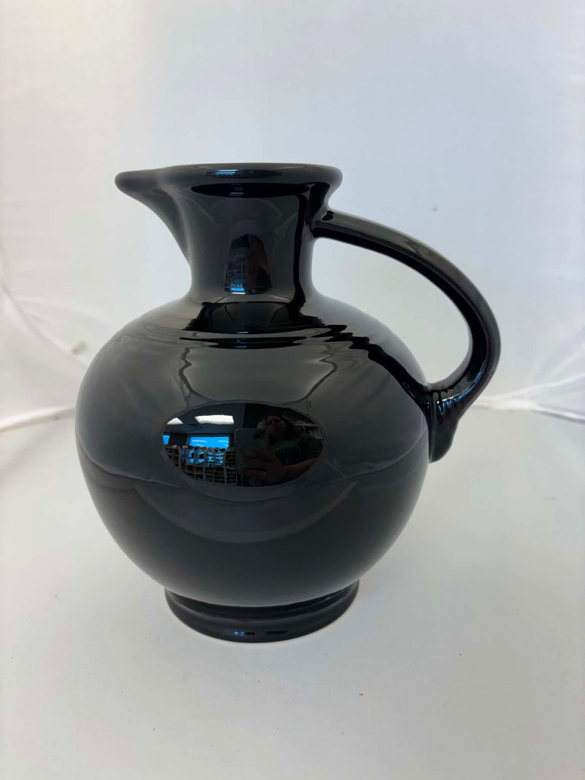 This is a Fiesta Fiestware small 60 Ounce Carafe in black. Lead-free Post 1986 Retired color retired shape
