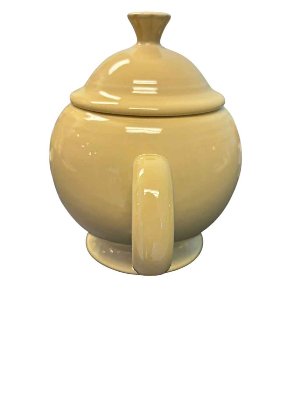 This is a Fiesta Fiestaware Five-cup 5-cup Ring Handled Tea Pot with Lid in Ivory. lead-free, Post 1986, Retired Color Retired Shape

