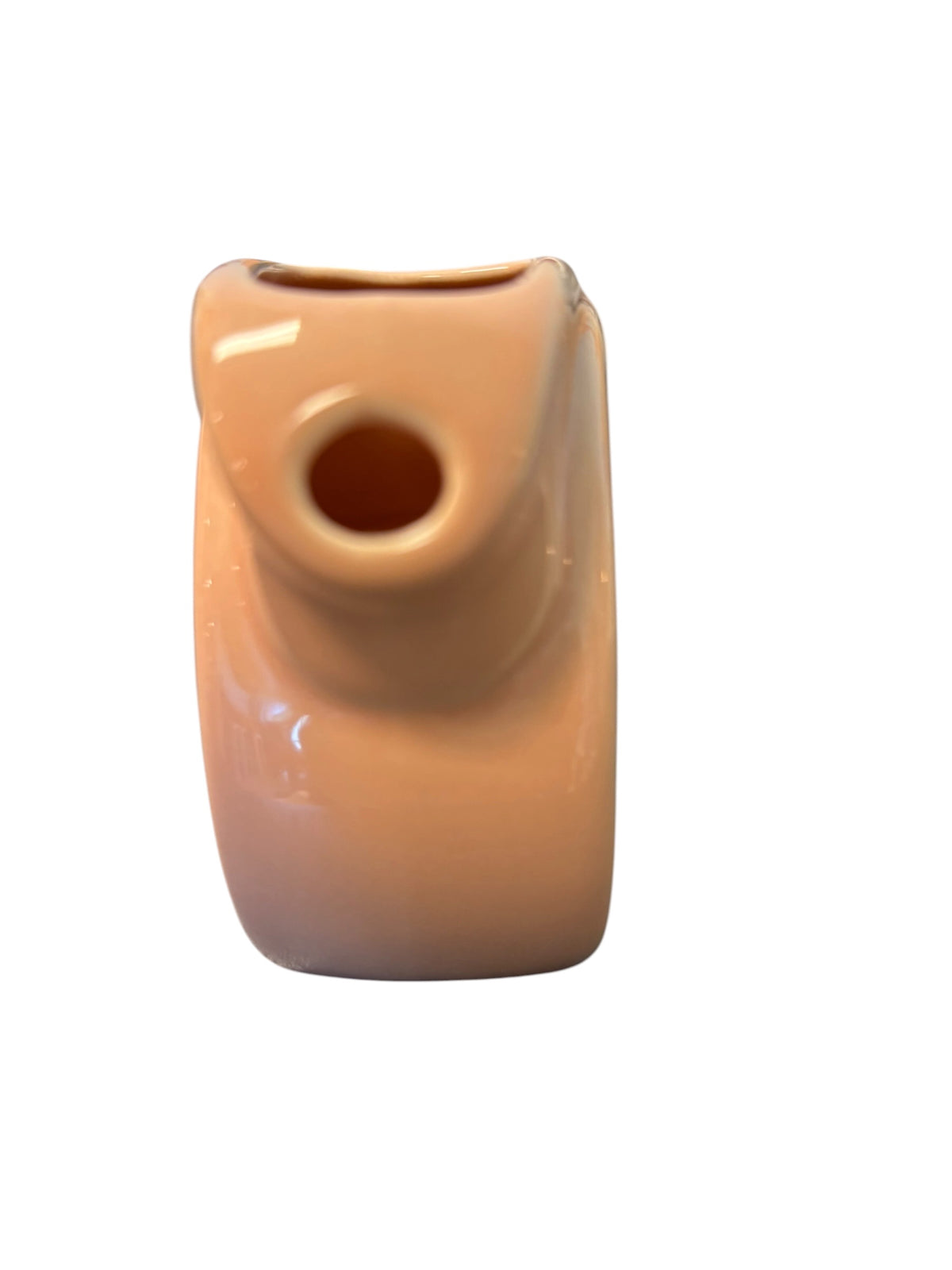 This is a Fiesta Fiestaware Mini Disc Pitcher Creamer in Apricot. lead-free, Post 1986, Retired Color 5 ounce