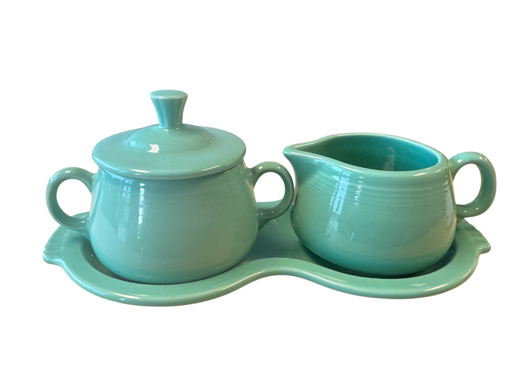 This is a Fiesta Fiestaware Creamer Pitcher Sugar Bowl with Lid on Figure Eight 8 Tray Set in Sea Mist Green. lead-free, Post 1986, Retired Color Retired Shape
