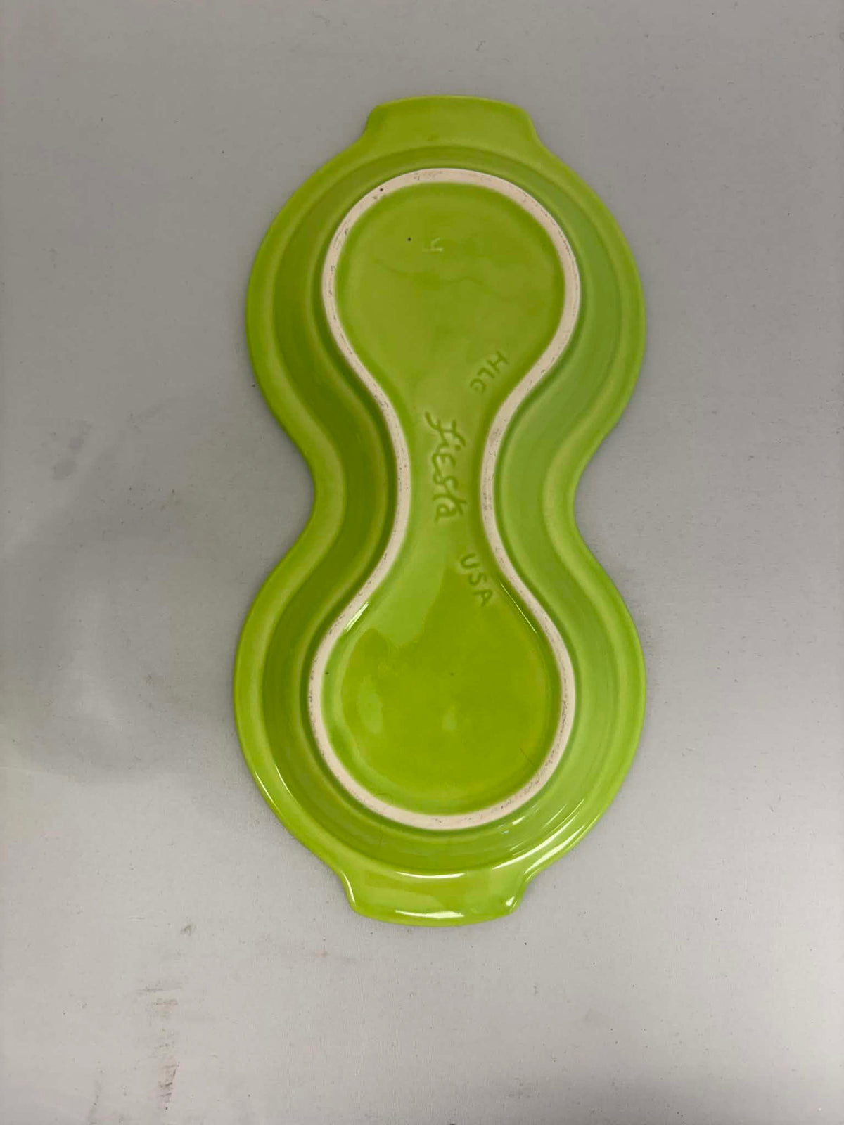 This is a Fiesta Fiestaware Creamer Pitcher Sugar Bowl with Lid on Figure Eight 8 Tray Set in chartreuse lead-free, Post 1986, Retired Color Retired Shape
