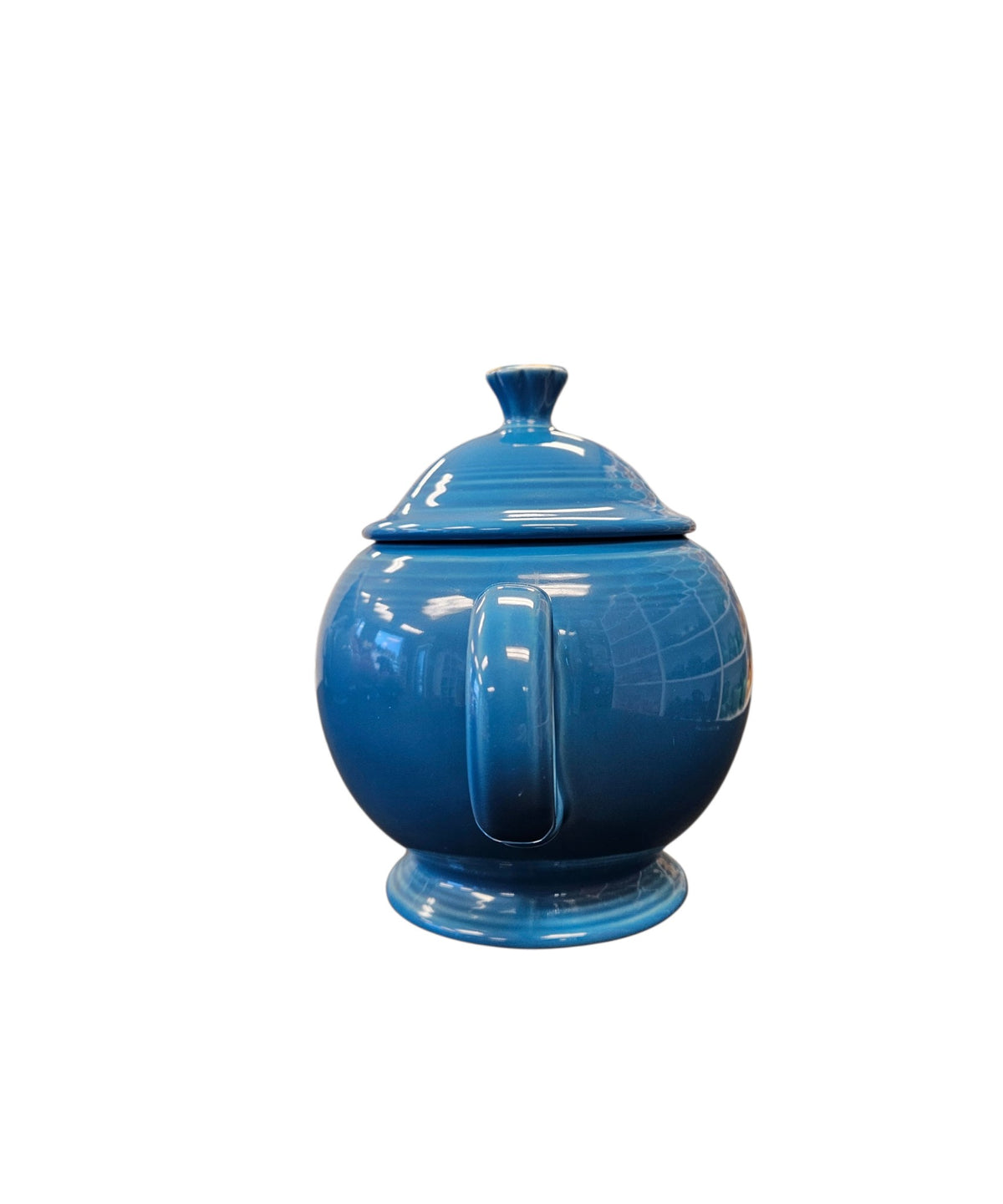 This is a Fiesta Fiestaware Five-cup 5-cup Ring Handled Tea Pot with Lid in Peacock. lead-free, Post 1986, Retired Color Retired Shape
