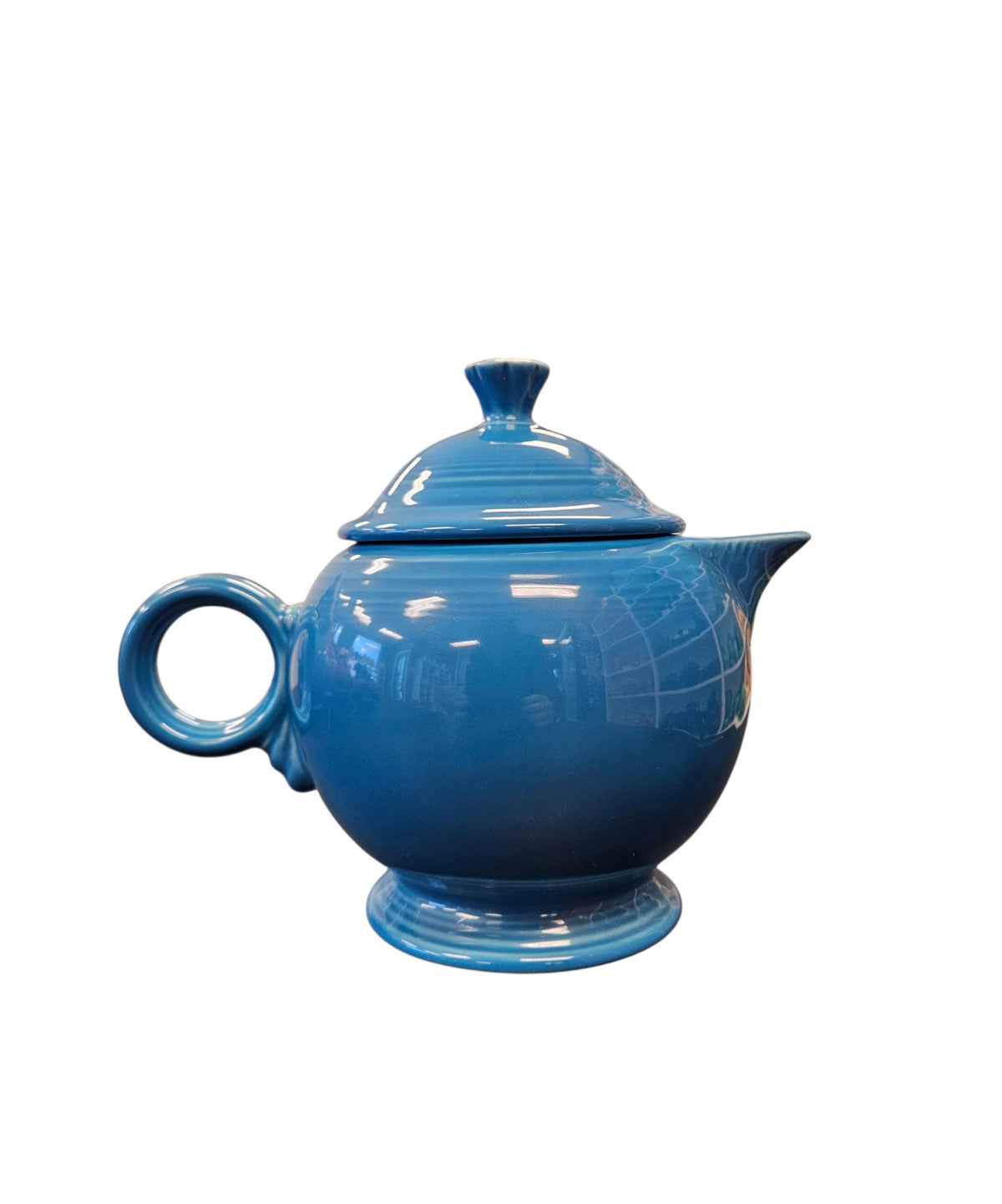 This is a Fiesta Fiestaware Five-cup 5-cup Ring Handled Tea Pot with Lid in Peacock. lead-free, Post 1986, Retired Color Retired Shape
