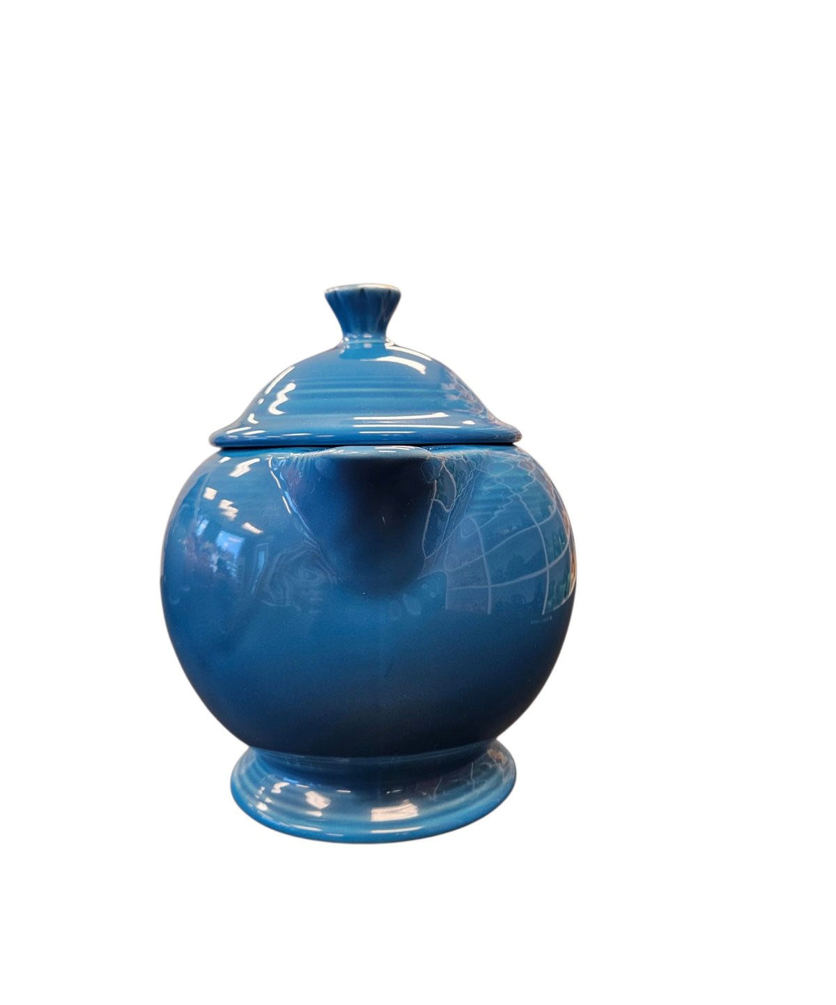 This is a Fiesta Fiestaware Five-cup 5-cup Ring Handled Tea Pot with Lid in Peacock. lead-free, Post 1986, Retired Color Retired Shape

