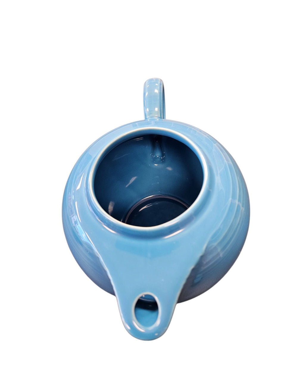 This is a Fiesta Fiestaware Five-cup 5-cup Ring Handled Tea Pot with Lid in Peacock. lead-free, Post 1986, Retired Color Retired Shape

