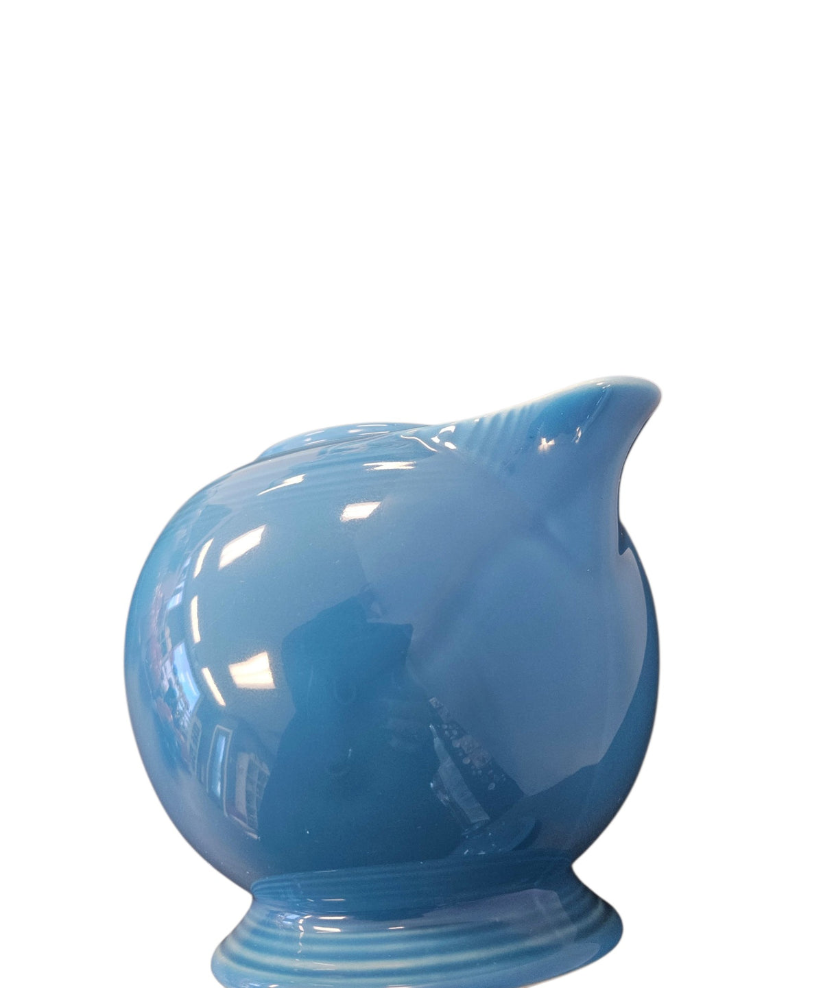 This is a Fiesta Fiestaware Five-cup 5-cup Ring Handled Tea Pot with Lid in Peacock. lead-free, Post 1986, Retired Color Retired Shape
