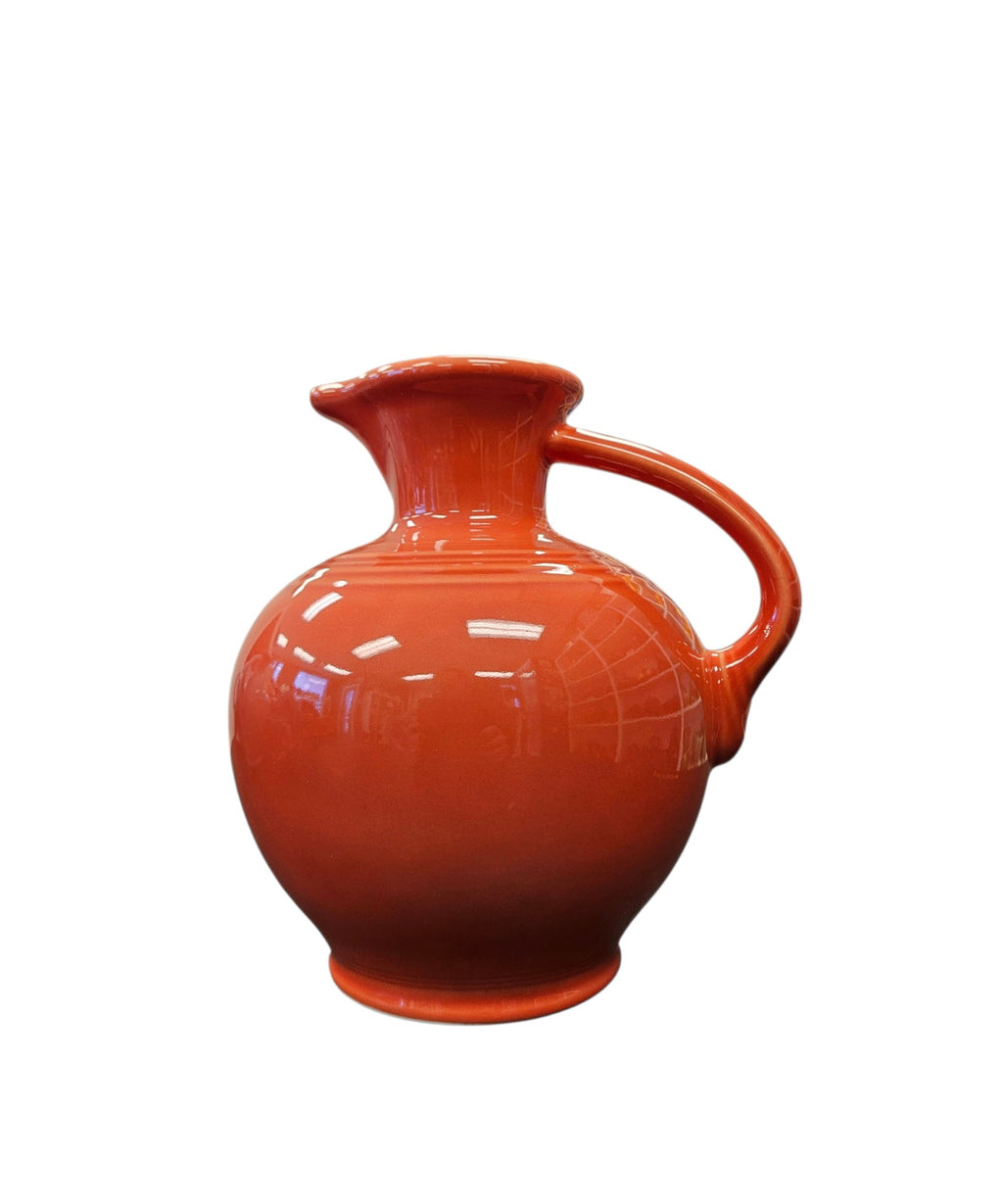 This is a Fiesta Fiestware small 60 Ounce Carafe in persimmon. Lead-free Post 1986 Retired color retired shape
