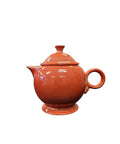 This is a Fiesta Fiestaware Five-cup 5-cup Ring Handled Tea Pot with Lid in Persimmon. lead-free, Post 1986, Retired Color Retired Shape
