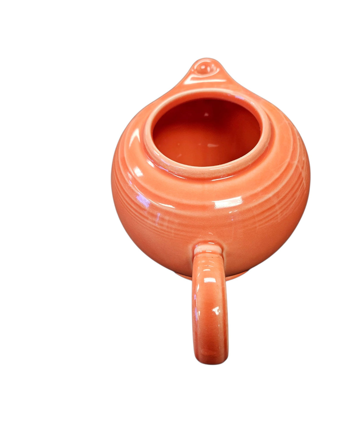 This is a Fiesta Fiestaware Five-cup 5-cup Ring Handled Tea Pot with Lid in Persimmon. lead-free, Post 1986, Retired Color Retired Shape
