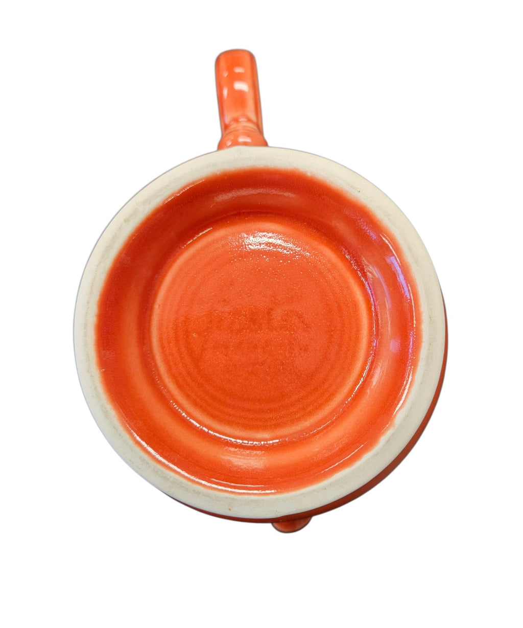 This is a Fiesta Fiestaware Five-cup 5-cup Ring Handled Tea Pot with Lid in Persimmon. lead-free, Post 1986, Retired Color Retired Shape
