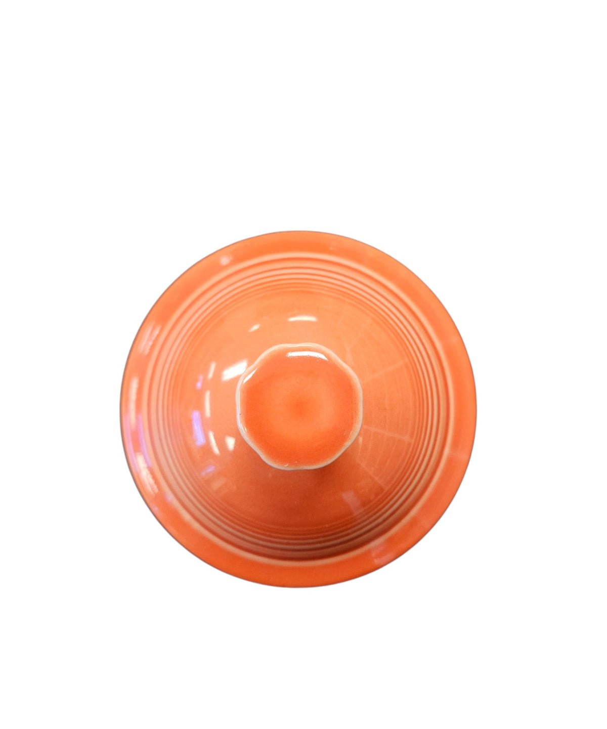 This is a Fiesta Fiestaware Five-cup 5-cup Ring Handled Tea Pot with Lid in Persimmon. lead-free, Post 1986, Retired Color Retired Shape
