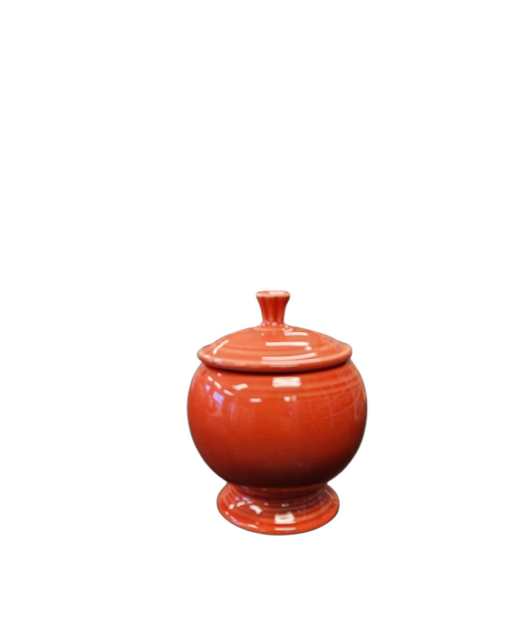 This is a Fiesta Fiestaware Individual Sugar Bowl With Lid in Persimmon. lead-free, Post 1986, Retired Color Retired Shape
