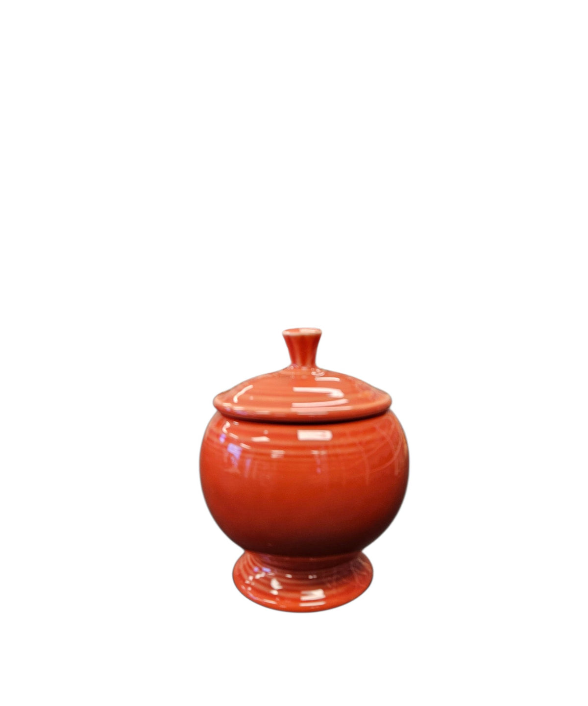 This is a Fiesta Fiestaware Individual Sugar Bowl With Lid in Persimmon. lead-free, Post 1986, Retired Color Retired Shape
