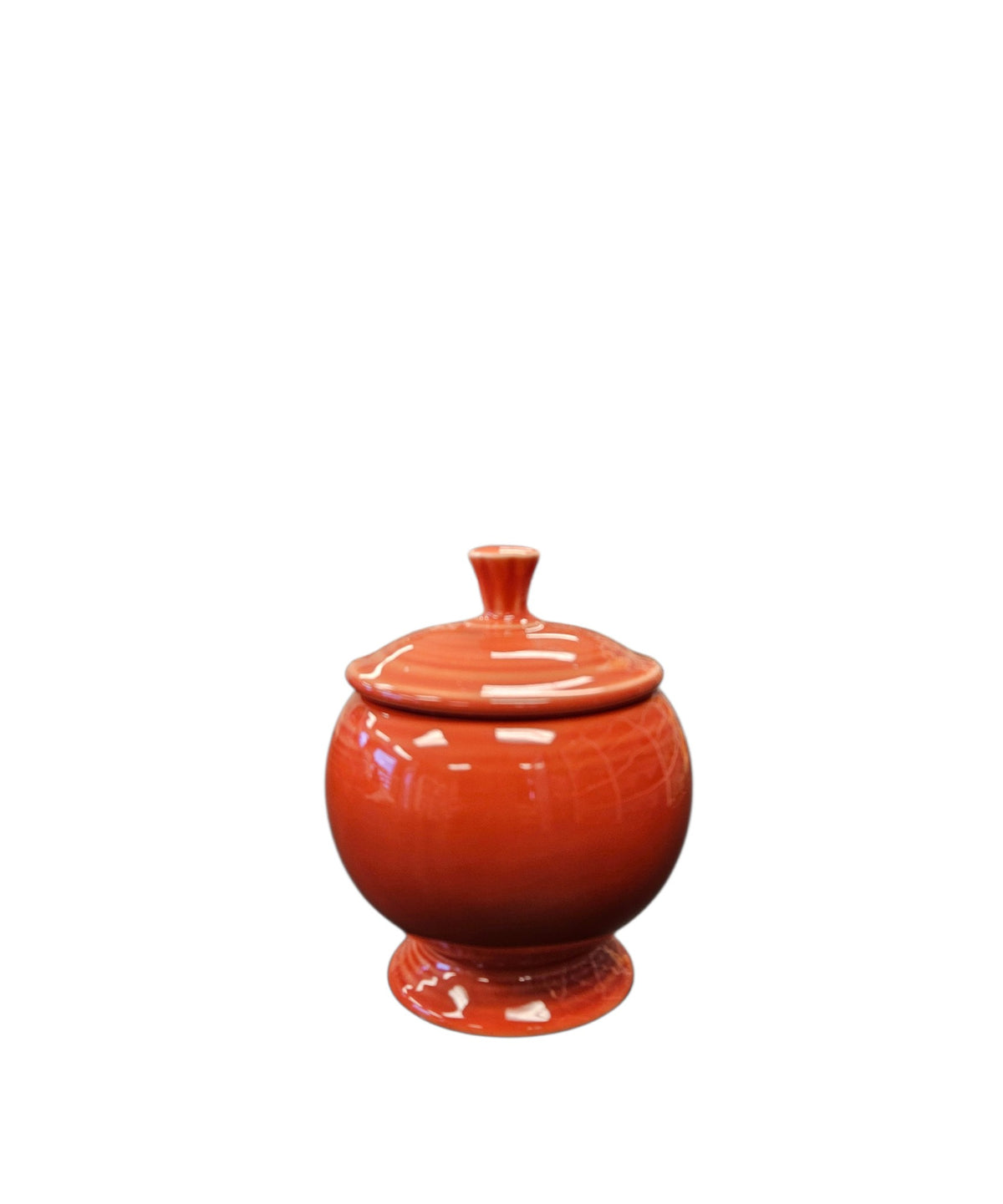 This is a Fiesta Fiestaware Individual Sugar Bowl With Lid in Persimmon. lead-free, Post 1986, Retired Color Retired Shape

