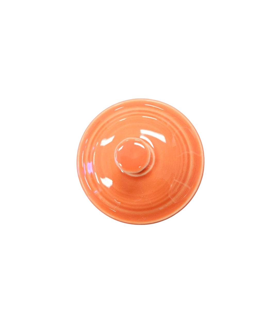 This is a Fiesta Fiestaware Individual Sugar Bowl With Lid in Persimmon. lead-free, Post 1986, Retired Color Retired Shape

