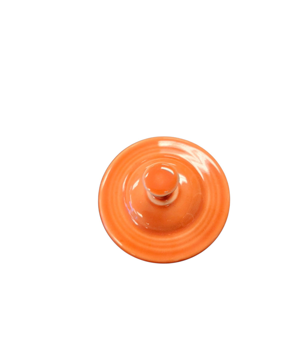 This is a Fiesta Fiestaware Creamer Pitcher Sugar Bowl with Lid on Figure Eight 8 Tray Set in persimmon lead-free, Post 1986, Retired Color Retired Shape
