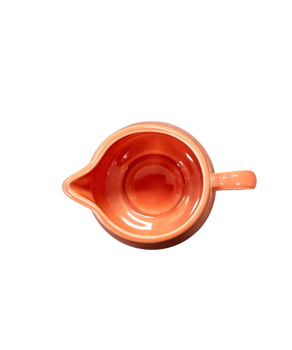 This is a Fiesta Fiestaware Creamer Pitcher Sugar Bowl with Lid on Figure Eight 8 Tray Set in persimmon lead-free, Post 1986, Retired Color Retired Shape
