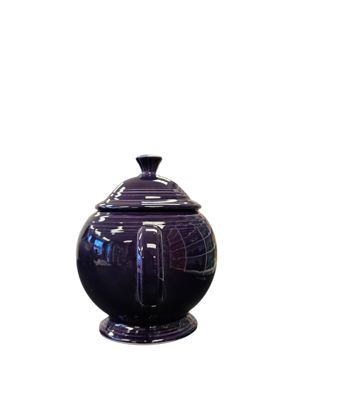 This is a Fiesta Fiestaware Five-cup 5-cup Ring Handled Tea Pot with Lid in Plum. lead-free, Post 1986, Retired Color Retired Shape

