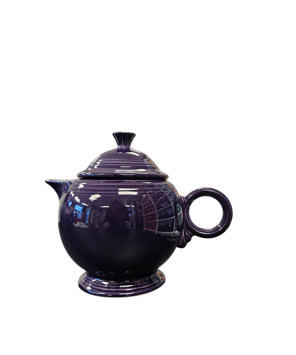 This is a Fiesta Fiestaware Five-cup 5-cup Ring Handled Tea Pot with Lid in Plum. lead-free, Post 1986, Retired Color Retired Shape

