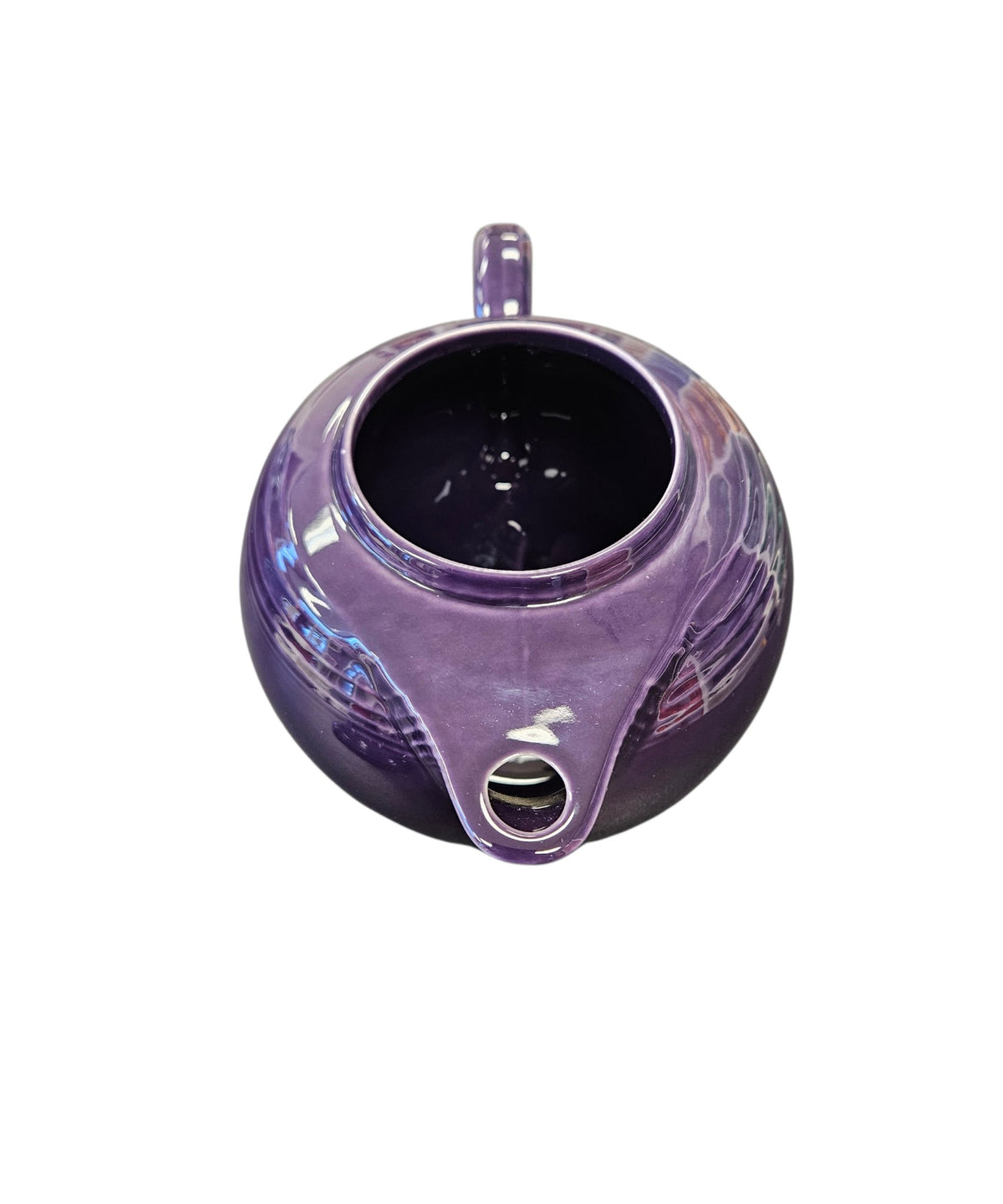 This is a Fiesta Fiestaware Five-cup 5-cup Ring Handled Tea Pot with Lid in Plum. lead-free, Post 1986, Retired Color Retired Shape
