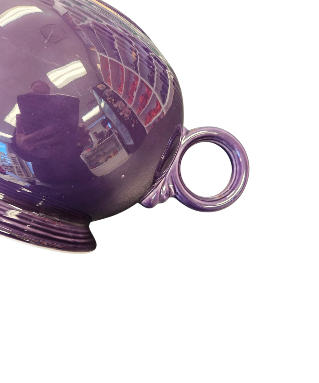 This is a Fiesta Fiestaware Five-cup 5-cup Ring Handled Tea Pot with Lid in Plum. lead-free, Post 1986, Retired Color Retired Shape
