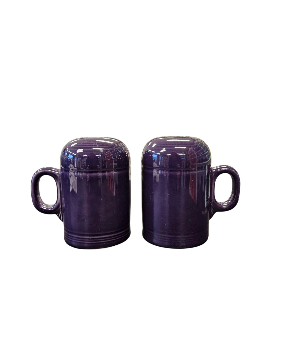 This is a Fiesta Fiestaware set of Range top Rangetop Salt and Pepper Shakers in plum. Post 1986 Retired Color Retired Shape Stove top Lead Free
