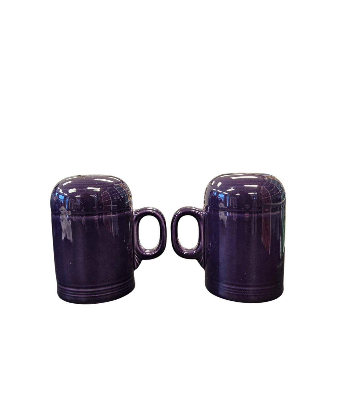 This is a Fiesta Fiestaware set of Range top Rangetop Salt and Pepper Shakers in plum. Post 1986 Retired Color Retired Shape Stove top Lead Free
