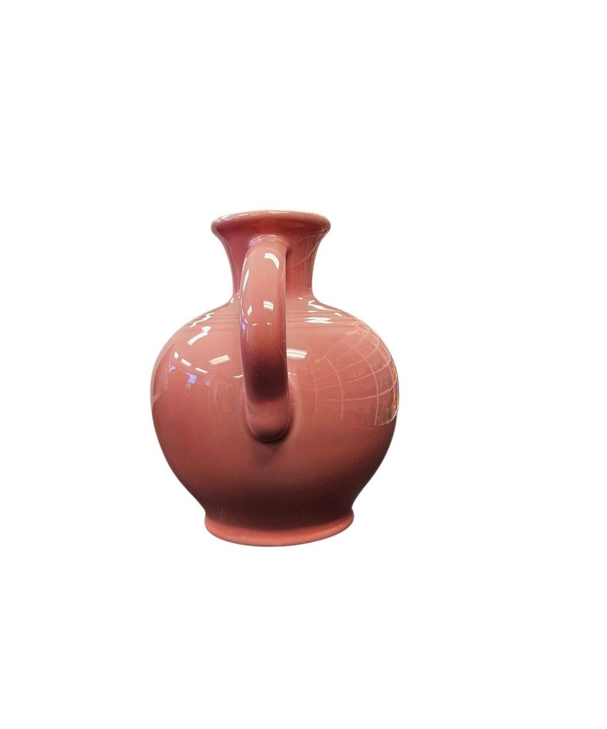 This is a Fiesta Fiestware small 60 Ounce Carafe in peony. Lead-free Post 1986 retired shape

