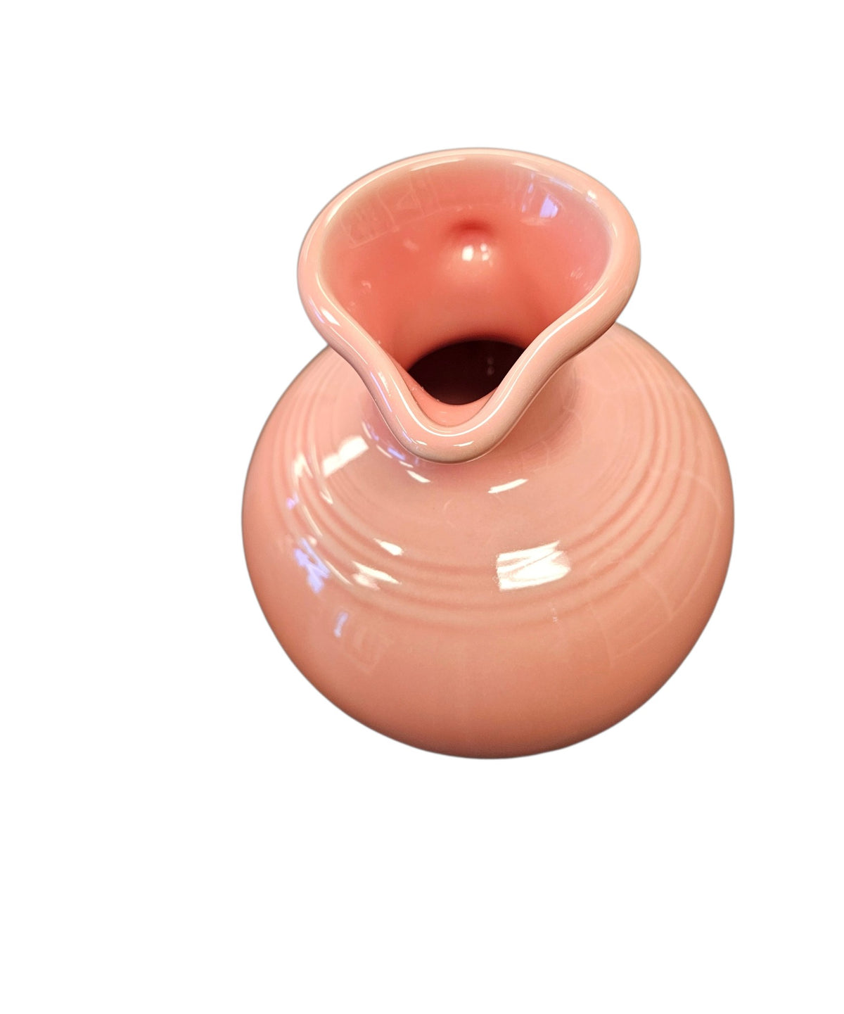 This is a Fiesta Fiestware small 60 Ounce Carafe in peony. Lead-free Post 1986 retired shape
