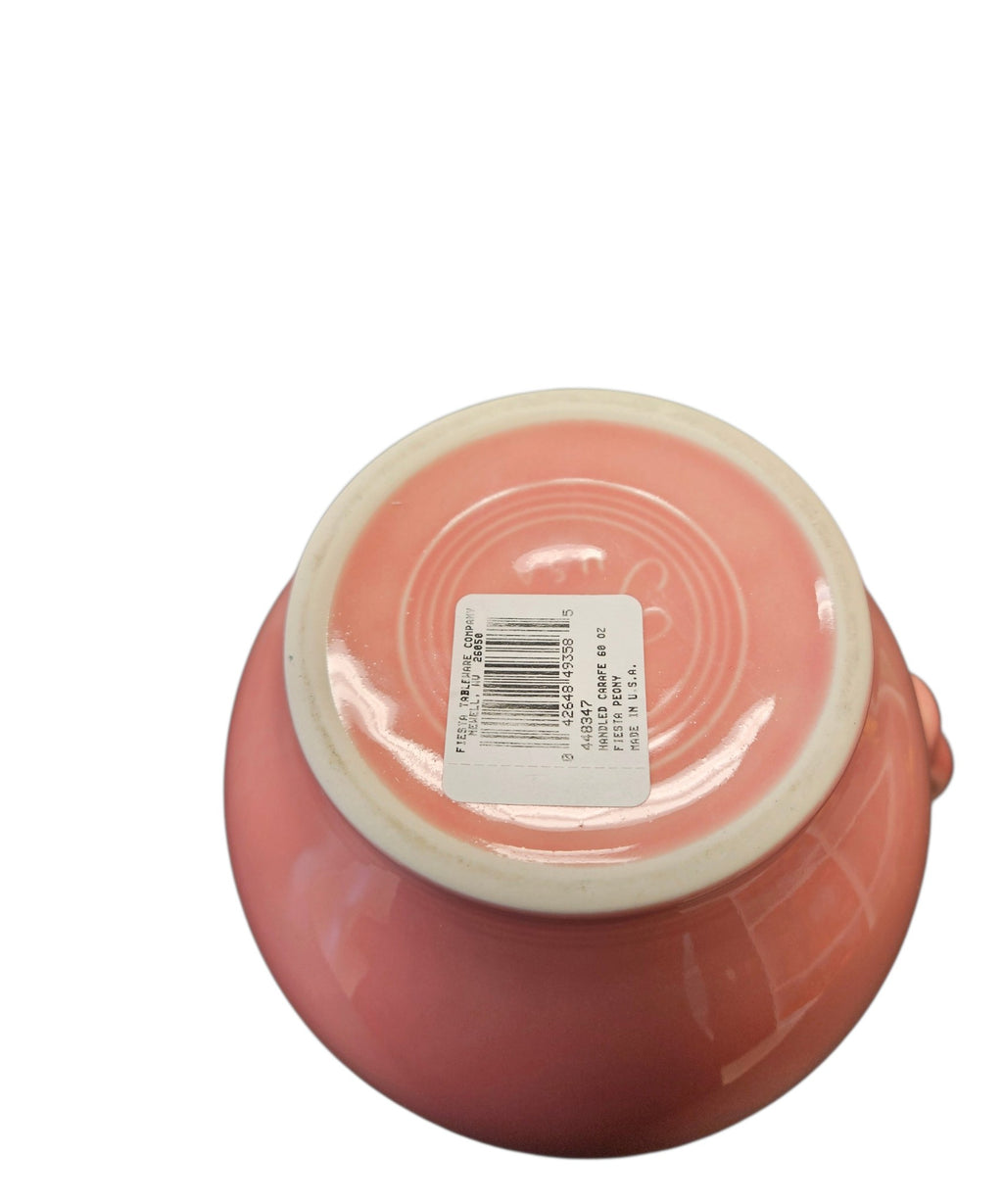 This is a Fiesta Fiestware small 60 Ounce Carafe in peony. Lead-free Post 1986 retired shape
