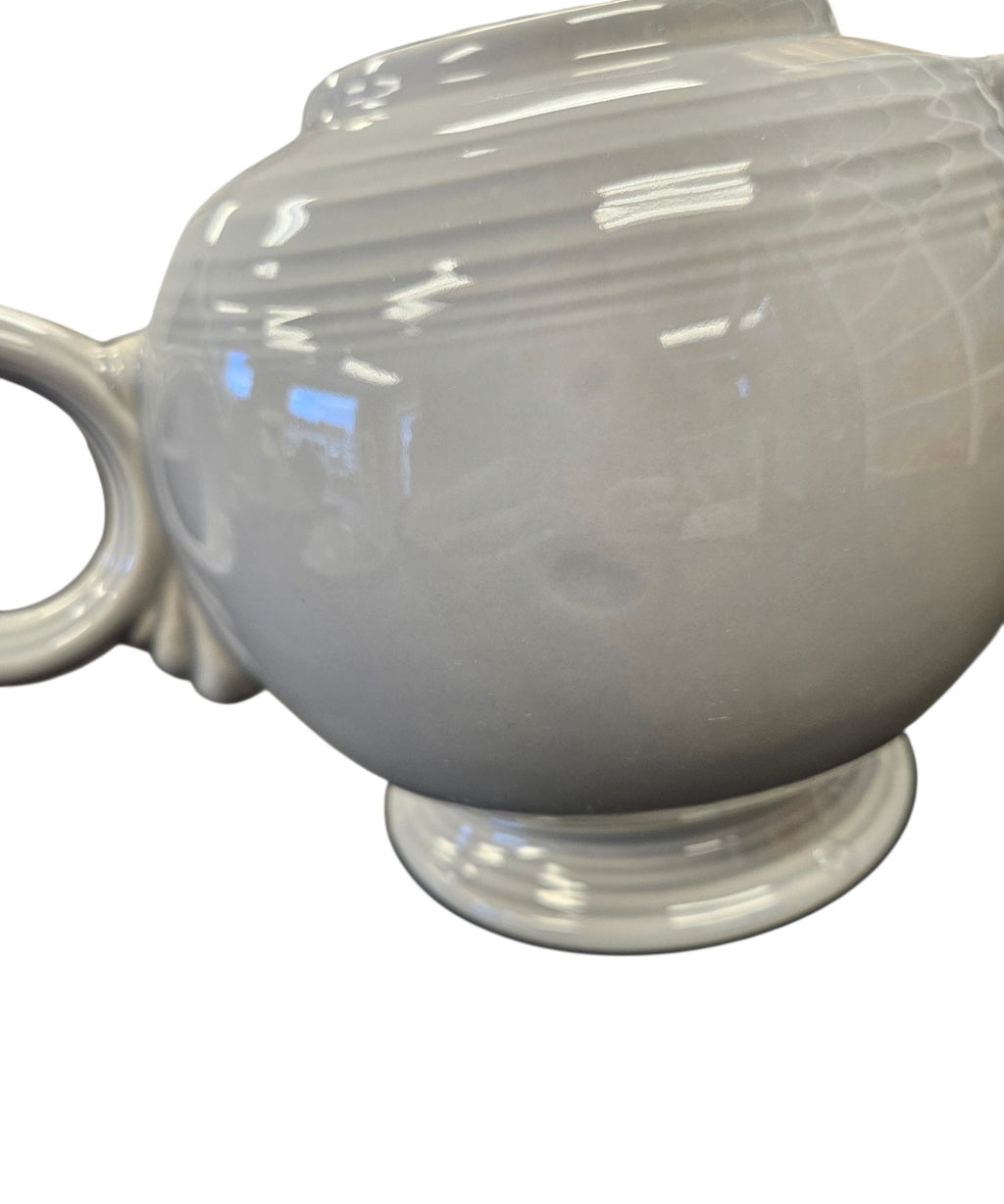 This is a Fiesta Fiestaware Five-cup 5-cup Ring Handled Tea Pot with Lid in Pearl Gray. lead-free, Post 1986, Retired Color Retired Shape
