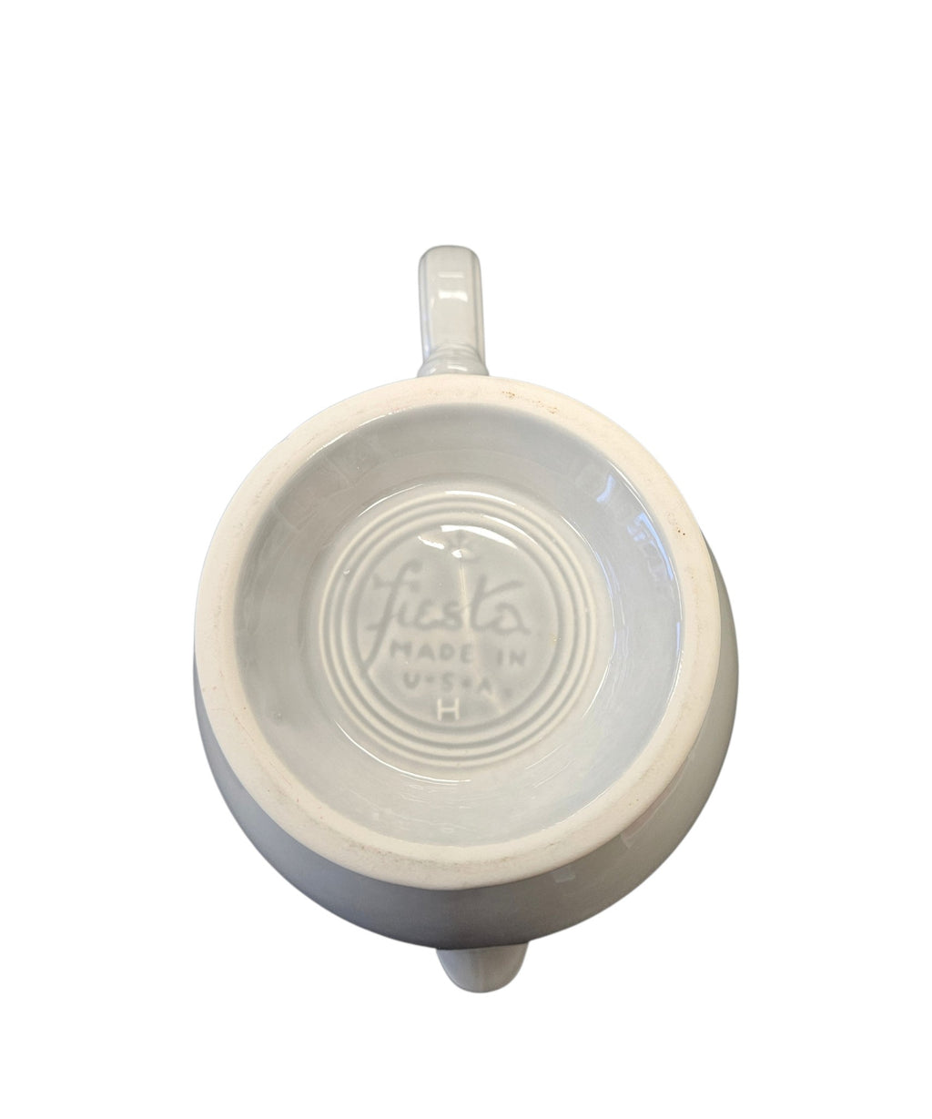 This is a Fiesta Fiestaware Five-cup 5-cup Ring Handled Tea Pot with Lid in Pearl Gray. lead-free, Post 1986, Retired Color Retired Shape
