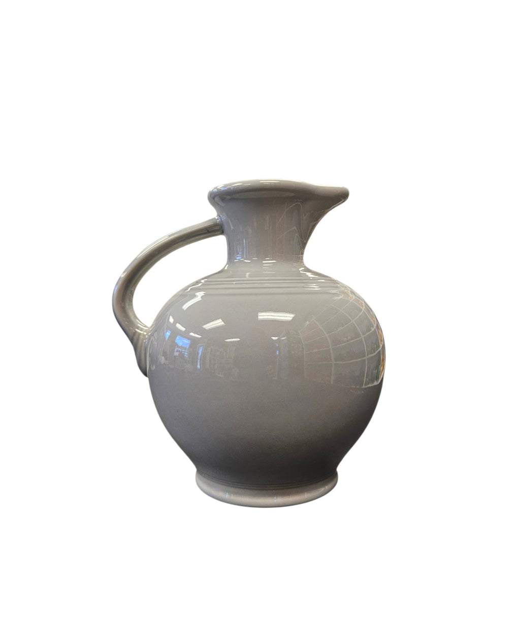 This is a Fiesta Fiestware small 60 Ounce Carafe in pearl-gray. Lead-free Post 1986 Retired color retired shape
