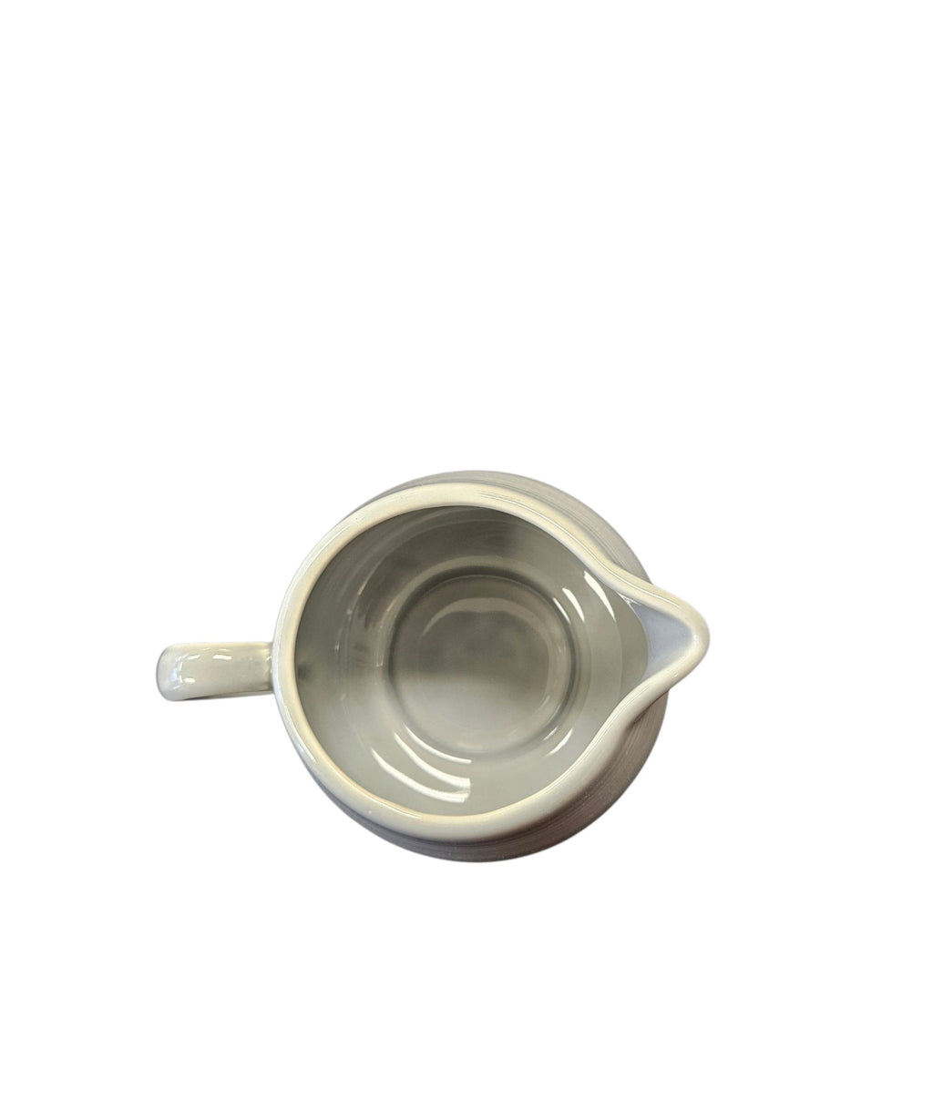 This is a Fiesta Fiestaware Creamer Pitcher Sugar Bowl with Lid on Figure Eight 8 Tray Set in pearl gray lead-free, Post 1986, Retired Color Retired Shape
