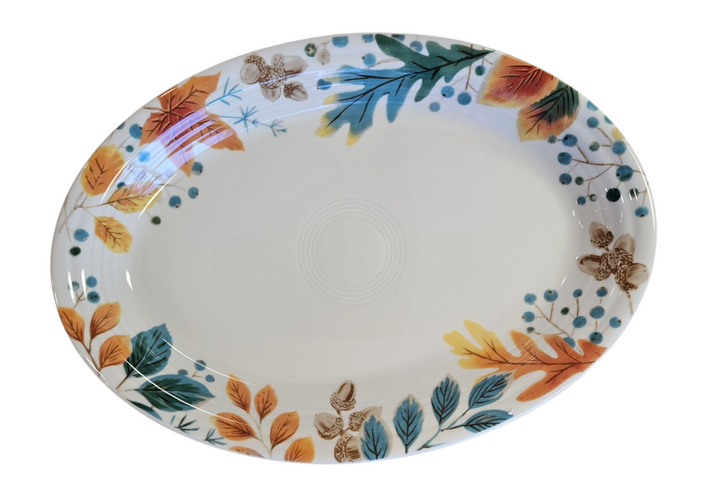 This is a Fiesta Fiestaware Large  Oval Platter featuring the Autumn Fields decal on Linen. lead-free, Post 1986, Fall, Leaves, Acorns, Greenery
