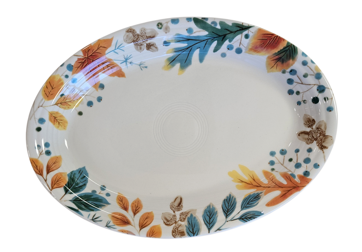 This is a Fiesta Fiestaware Large  Oval Platter featuring the Autumn Fields decal on Linen. lead-free, Post 1986, Fall, Leaves, Acorns, Greenery
