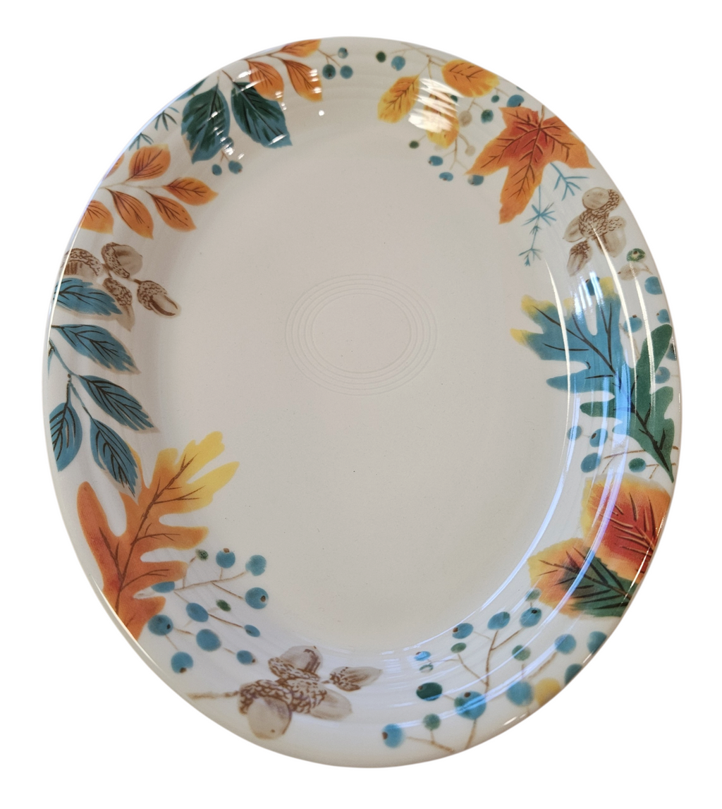 This is a Fiesta Fiestaware Large  Oval Platter featuring the Autumn Fields decal on Linen. lead-free, Post 1986, Fall, Leaves, Acorns, Greenery
