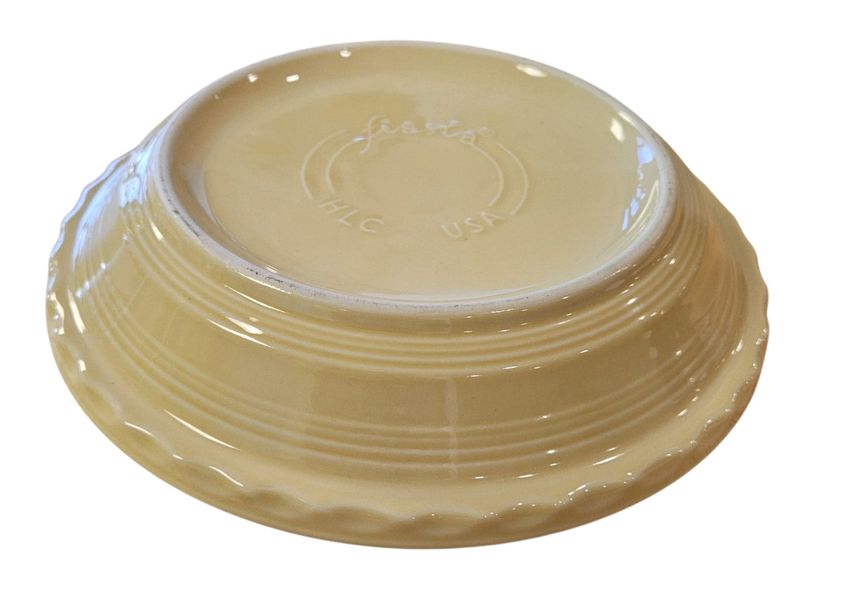 This is a Fiesta fiestaware Large Pie Baker featuring Everything Kitchen's Fall Forest decal on Ivory. Lead free, Post 1986 Retired Decal, Retired Color, limited quantities available via EK, Fall, Greenery, Cabin, Bird, Turkey, Tree, Thanksgiving
