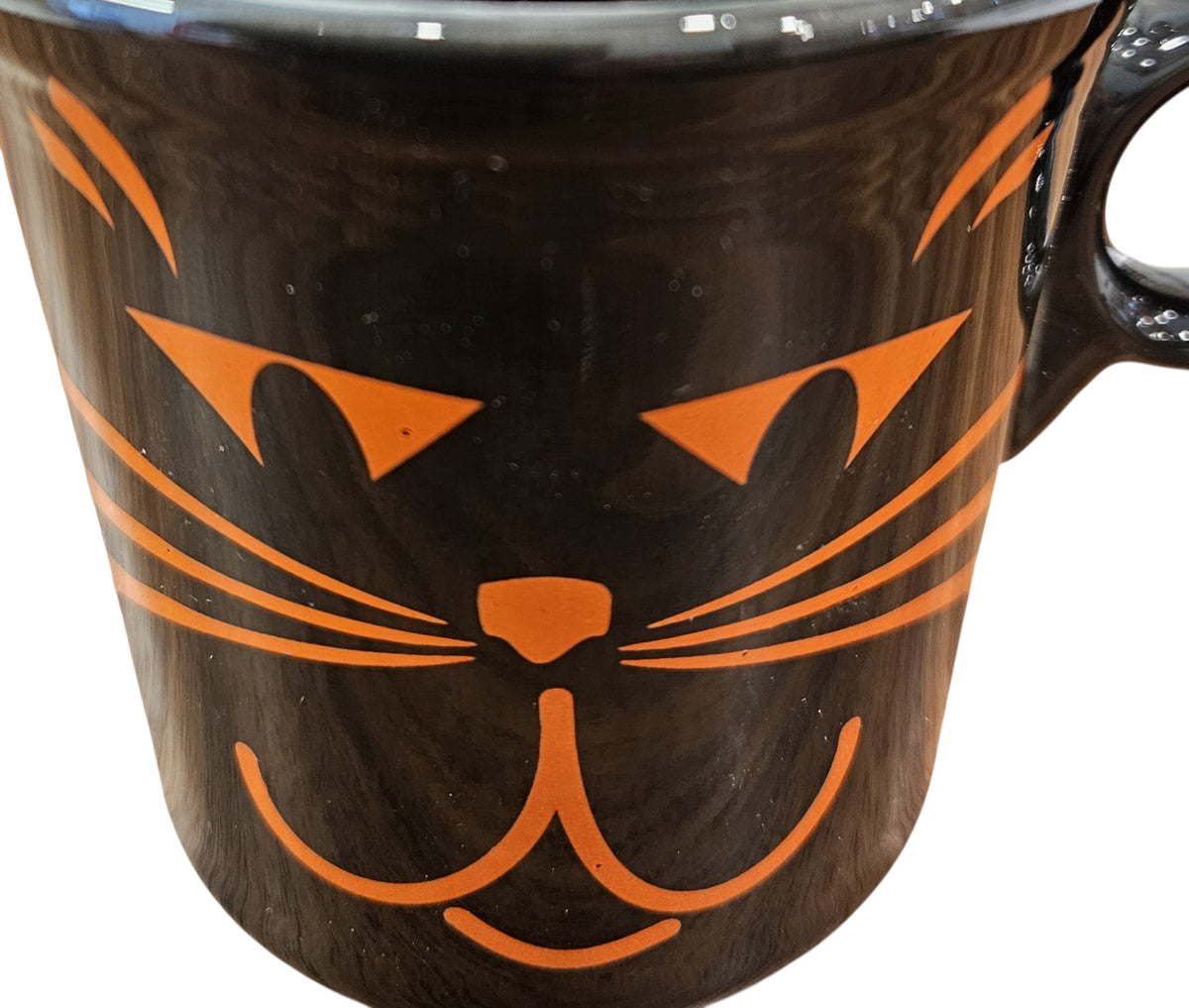 This is Fiesta fiestware Classic Ring Handled Mug featuring the Betty Crocker Black Cat decal on black. Lead free, post 1986, retired color, retired decal, Hard to Find, Halloween
