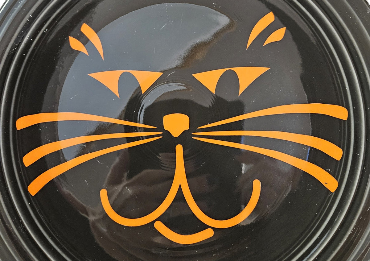 This is Fiesta fiestware Classic Dinner Plate featuring the Betty Crocker Black Cat decal on black. Lead free, post 1986, retired color, retired decal, Hard to Find, Halloween
