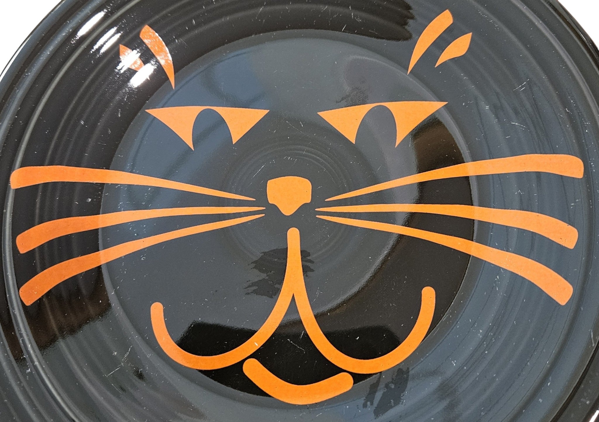 This is Fiesta fiestware Classic Chop Plate featuring the Betty Crocker Black Cat decal on black. Lead free, post 1986, retired color, retired decal, Hard to Find, Halloween
