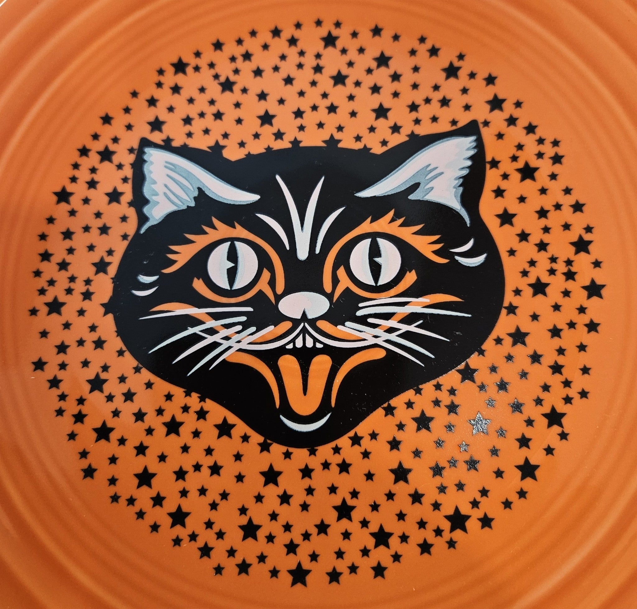 This is a Fiesta fiestaware Classic Luncheon Plate featuring the Black Cat decal on poppy. Lead free, Post 1986, Halloween
