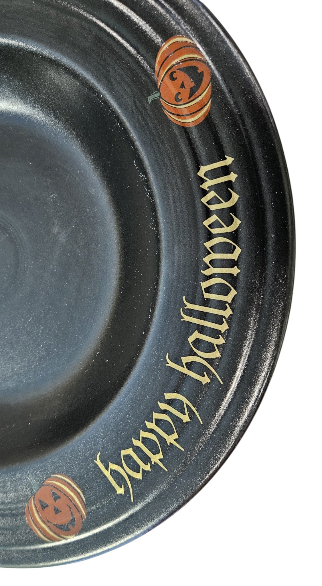 This is Fiesta fiestware Classic 12" Rimmed Pasta Bowl featuring the Trio of Happy Pumpkins decal on black/foundry. Lead free, post 1986,  retired decal, retired shape, limited production color, Halloween
