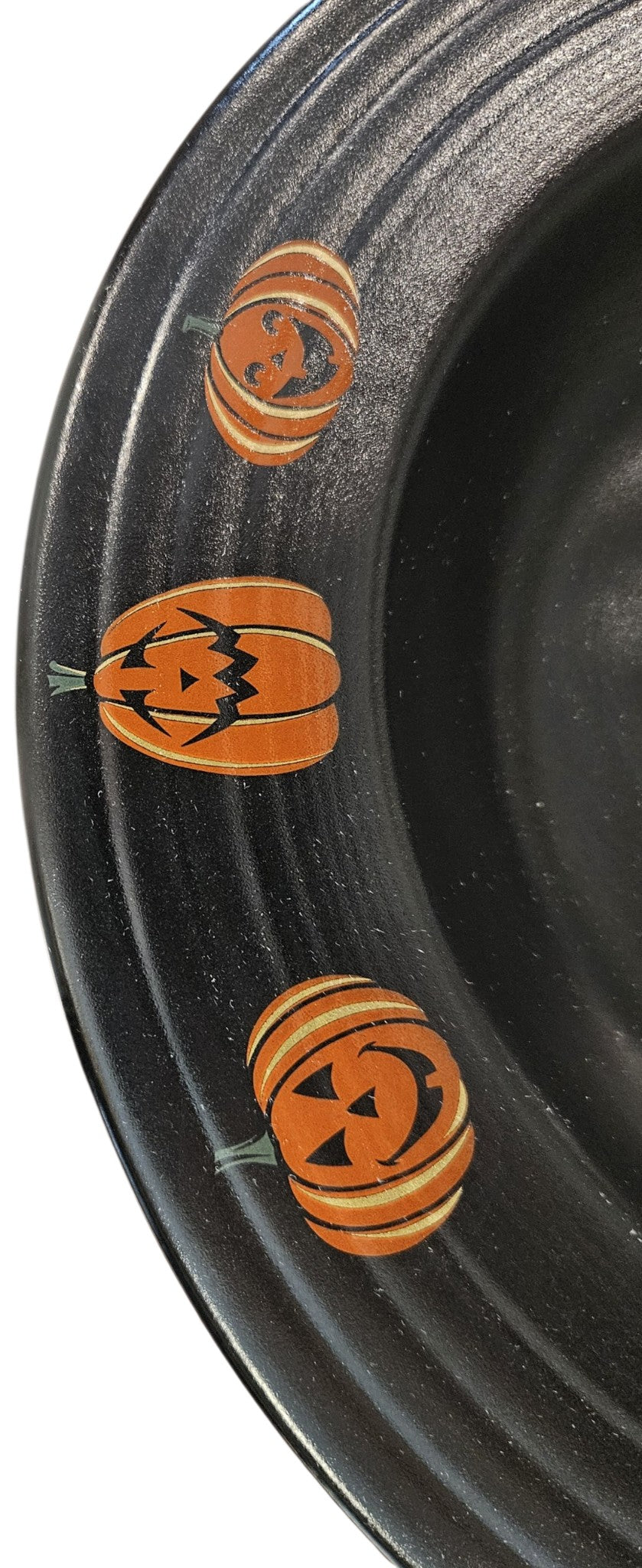 This is Fiesta fiestware Classic 12" Rimmed Pasta Bowl featuring the Trio of Happy Pumpkins decal on black/foundry. Lead free, post 1986,  retired decal, retired shape, limited production color, Halloween
