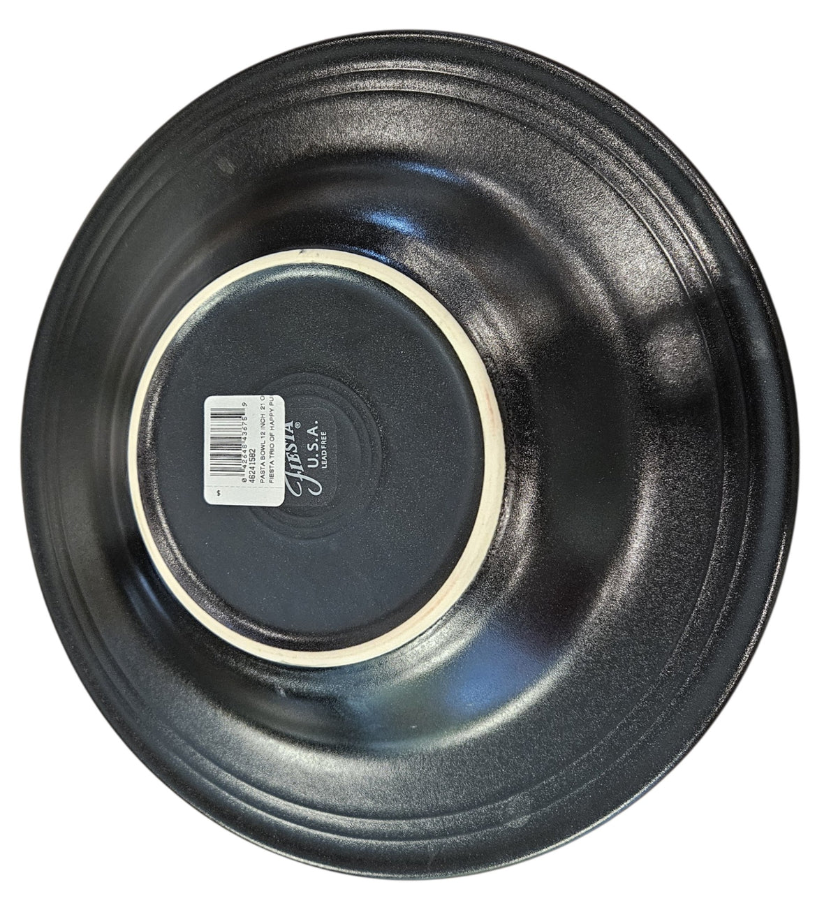 This is Fiesta fiestware Classic 12" Rimmed Pasta Bowl featuring the Trio of Happy Pumpkins decal on black/foundry. Lead free, post 1986,  retired decal, retired shape, limited production color, Halloween

